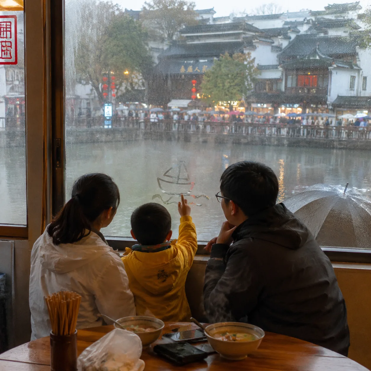 A May Rain by Nanjing's City Wall Stranded Our Family of Three and Delivered the Best Bowl of Duck Blood Soup Instead